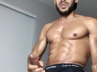 muscular black guy in black boxers wanks and cums